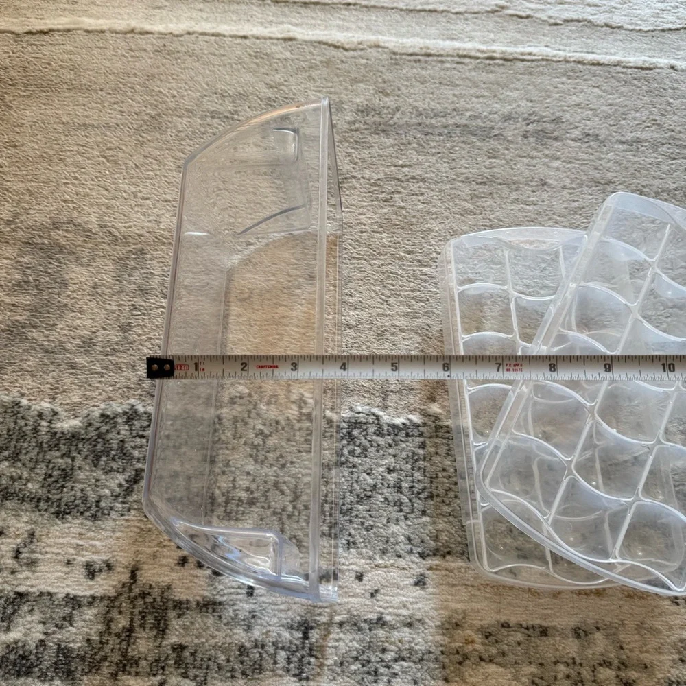 Bundle of 2 ice cube trays and plastic storage bin